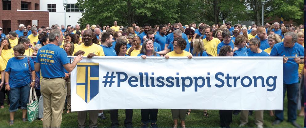 Pellissippi State Community College members holding a #PellissippiStrong banner
