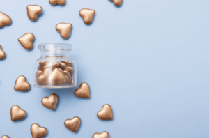 Jar of hearts representing contributions to an EOY fundraising review